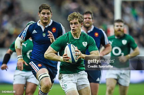 March 2014; Ireland's Andrew Trimble makes a break during the second half. RBS Six Nations Rugby Championship 2014, France v Ireland, Stade De...
