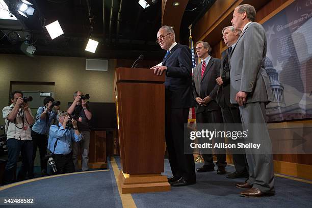 Left to right, Senators Charles Schumer , Jeff Merkley , Sheldon Whitehouse , and Tom Udall hold a news conference in the U.S. Capitol building on...