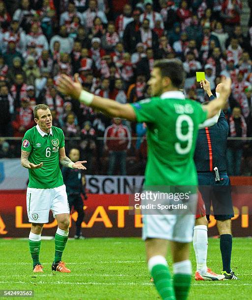October 2015; Glenn Whelan, Republic of Ireland, reacts after receiving a yellow card from referee Cüneyt Çakir. UEFA EURO 2016 Championship...