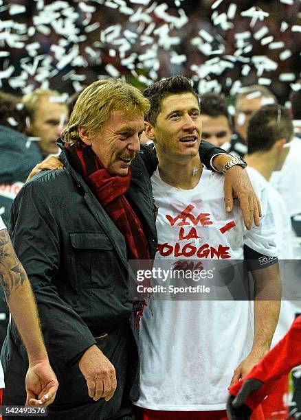 October 2015; Former Polish International Zbigniew Boniek celebrates with Robert Lewandowski at the end of the game. UEFA EURO 2016 Championship...