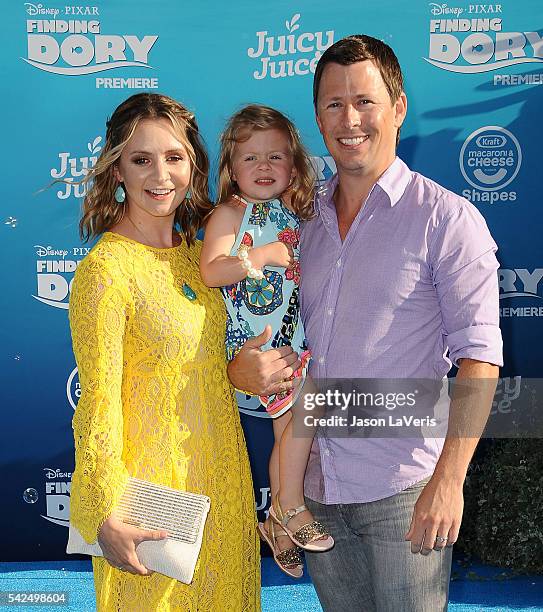 Actress Beverley Mitchell, husband Michael Cameron and daughter Kenzie Cameron attend the premiere of "Finding Dory" at the El Capitan Theatre on...