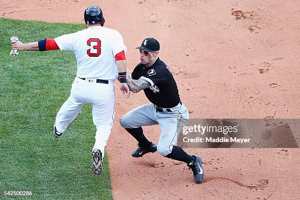 Brett Lawrie of the Chicago White Sox tags out Sandy Leon of the Boston Red Sox during the sixth inning at Fenway Park on June 23, 2016 in Boston,...