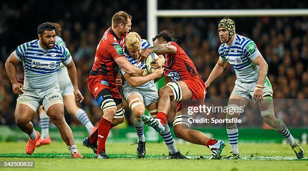 May 2014; Jackson Wray, Saracens, is tackled by Ali Williams, left, and Jocelino Suta, Toulon. Heineken Cup Final, Toulon v Saracens. Millennium...