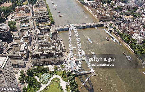 united kingdom, london, aerial view of river thames with london eye and westminster bridge - mattscutt stock pictures, royalty-free photos & images