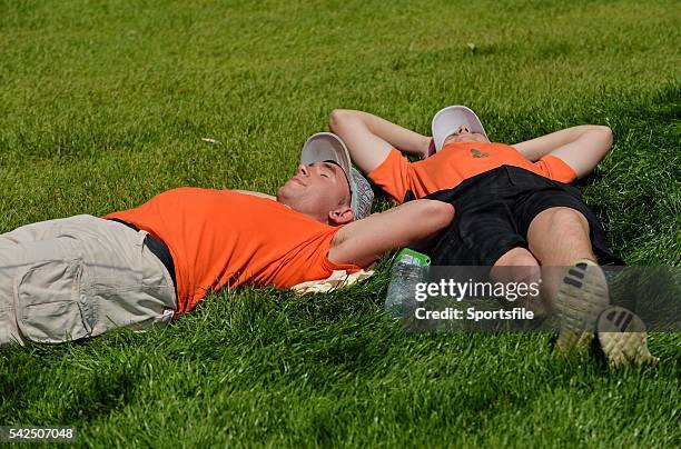 June 2014; PJ Hall, left, from Adare, and Shane Irwin, from Bruff, both Co. Limerick, enjoy the sunshine on the eighth fairway during day 1 of the...