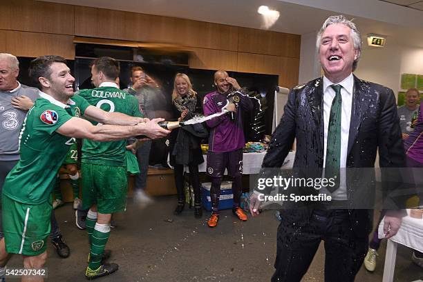 November 2015; Republic of Ireland's Wes Hoolahan and FAI Chief Executive John Delaney celebrate in the dressingroom after the game. UEFA EURO 2016...