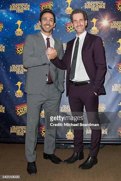 Amir Arison and Aaron Abrams pose in the press room at the 42nd Annual Saturn Awards at The Castaway on June 22, 2016 in Burbank, California.
