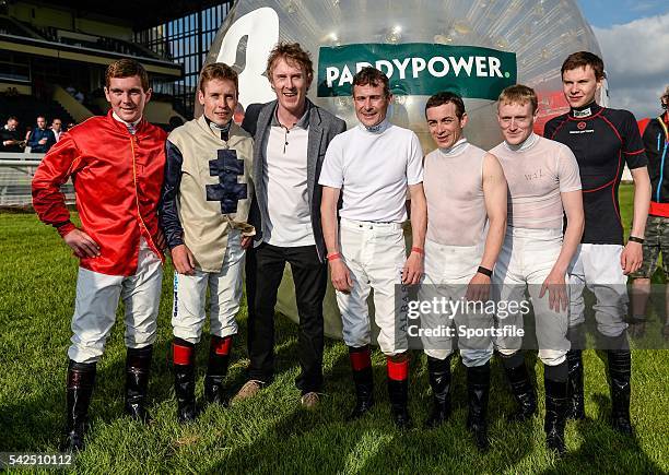 Jockies, from left, Gary Carroll, Leigh Roche, Pat Smullen, Wayne Lordan, Billy Lee and Joseph O'Brien with Hector O hEochagain after the Paddy Power...