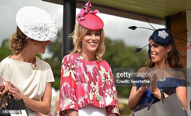 Caitriona Hanley, from Limerick, reacts as she is declared winner of Best Dressed Lady during the day's races. 2014 Dubai Duty Free Irish Derby...