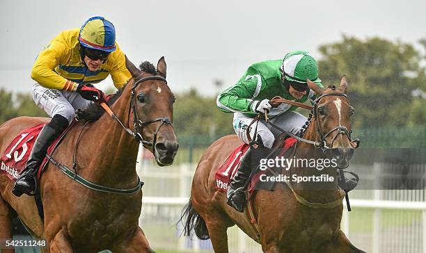 July 2014; Cacheofgold, right, with Jonathan Burke up, races Supreme Vic, with Shane Shortall up, towards the finish on their way to winning the...