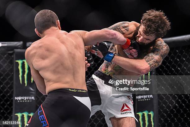 December 2015; Michael Chiesa, right, in action against Jim Miller during their lightweight bout. UFC Fight Night: VanZant v Namajunas, The Chelsea...