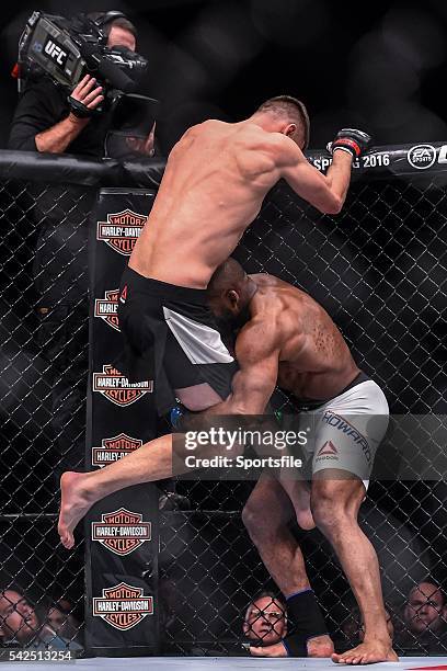 December 2015; Tim Means, left, in action against John Howard during their welterweight bout. UFC Fight Night: VanZant v Namajunas, The Chelsea at...