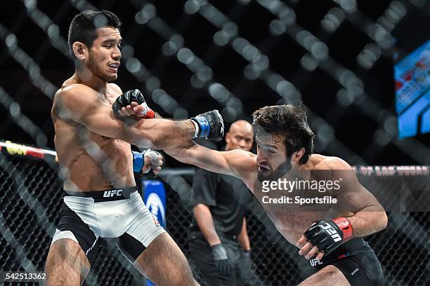 December 2015; Zubaira Tukhugov, right, in action against Phillipe Nover during their featherweight bout. UFC Fight Night: VanZant v Namajunas, The...