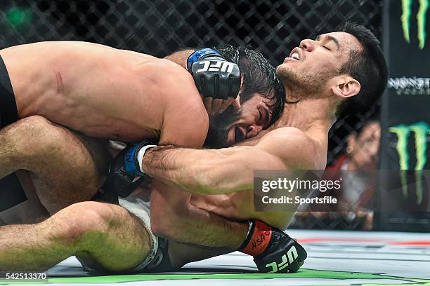 December 2015; Zubaira Tukhugov, left, in action against Phillipe Nover during their featherweight bout. UFC Fight Night: VanZant v Namajunas, The...