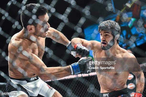 December 2015; Zubaira Tukhugov, right, in action against Phillipe Nover during their featherweight bout. UFC Fight Night: VanZant v Namajunas, The...