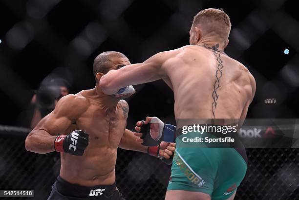 December 2015; Conor McGregor, right, lands a left punch on Jose Aldo, resulting in a knock-out stoppage after 13 seconds of round one. UFC 194: Jose...