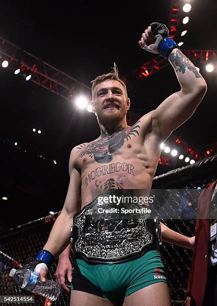 December 2015; Conor McGregor celebrates defeating Jose Aldo to win the UFC Featherweight Championship title. UFC 194: Jose Aldo v Conor McGregor,...