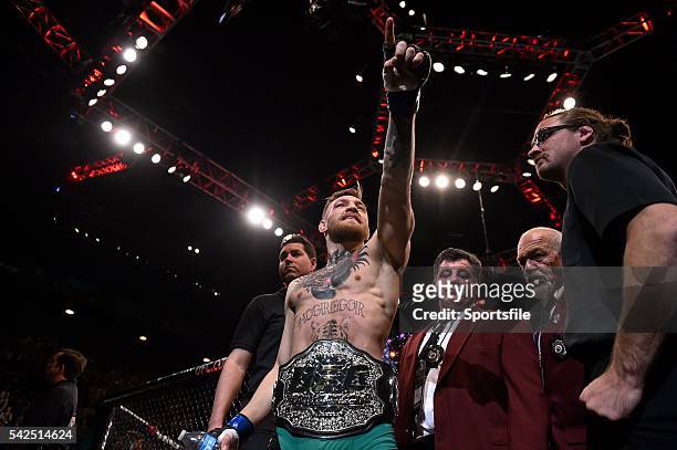 December 2015; Conor McGregor celebrates defeating Jose Aldo to win the UFC Featherweight Championship title. UFC 194: Jose Aldo v Conor McGregor,...