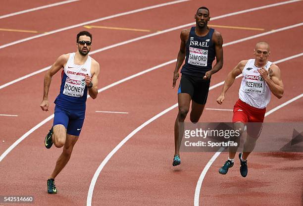 August 2014; Martyn Rooney of Great Britain, left, on his way to winning the final of the men's 400m event. Also pictured are Donald Sanford of...