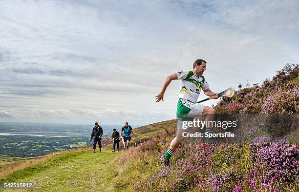 August 2014; Brendan Cummins, Tipperary, makes his way up the mountain to take his next shot during the M. Donnelly All-Ireland Poc Fada Final....