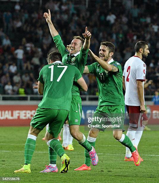 September 2014; Aiden McGeady, centre, Republic of Ireland, celebrate's after scoring his side's second and winning goal with team-mate's Stephen...