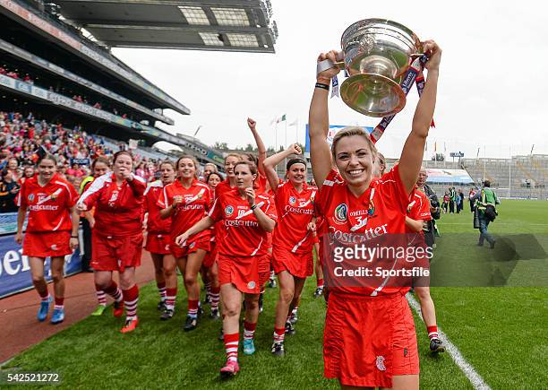 September 2014; Cork captain Anna Geary and teammates celebrate with the the O'Duffy cup after the game. Liberty Insurance All Ireland Senior Camogie...