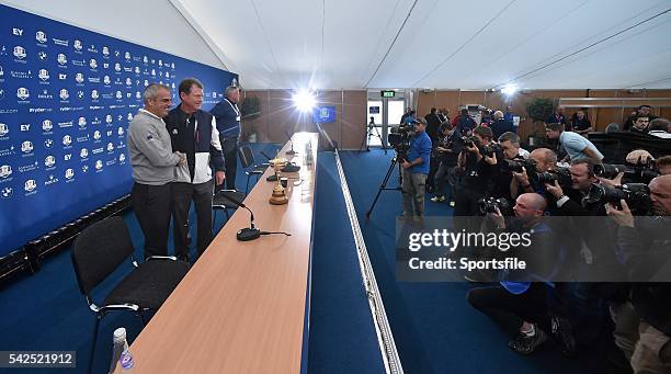 September 2014; European team captain Paul McGinley shakes hands with USA team captain Tom Watson during the captains joint press conference. The...