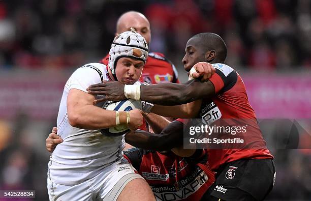 January 2016; Luke Marshall, Ulster, is tackled by Dug Codjo, Oyonnax. European Rugby Champions Cup, Pool 1, Round 6, Ulster v Oyonnax, Kingspan...