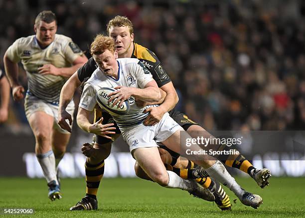 January 2016; Cathal Marsh, Leinster, is tackled by Joe Launchbury and George Smith, Wasps. European Rugby Champions Cup, Pool 5, Round 6, Wasps v...