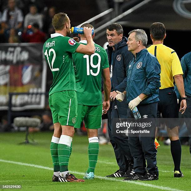 October 2014; Republic of Ireland assistant manager Roy Keane issues instructions to Jonathan Walters and David Myler during the first half. UEFA...