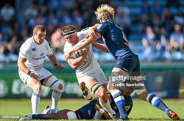 October 2014; Rhys Ruddock, Leinster, is tackled by Jannie Bornman and Richie Gray, right, Castres. European Rugby Champions Cup 2014/15, Pool 2,...