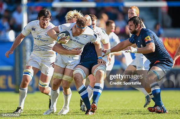 October 2014; Jamie Heaslip, Leinster, is tackled by Richie Gray, Castres. European Rugby Champions Cup 2014/15, Pool 2, Round 2, Castres Olympique v...