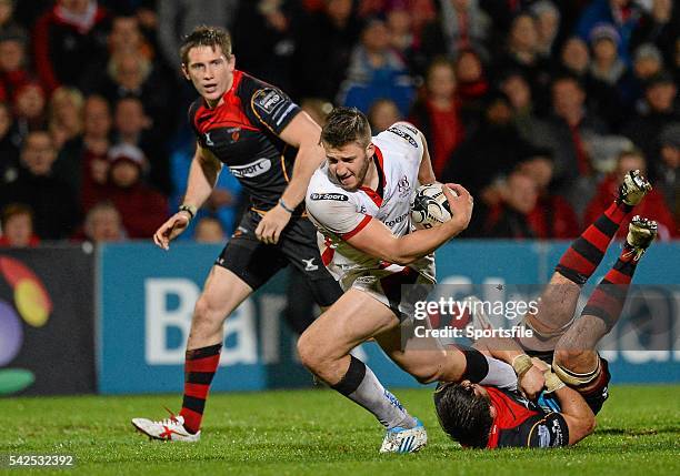 November 2014; Stuart McCloskey, Ulster, is tackled by James Benjamin, Newport Gwent Dragons. Guinness PRO12, Round 7, Ulster v Newport Gwent...