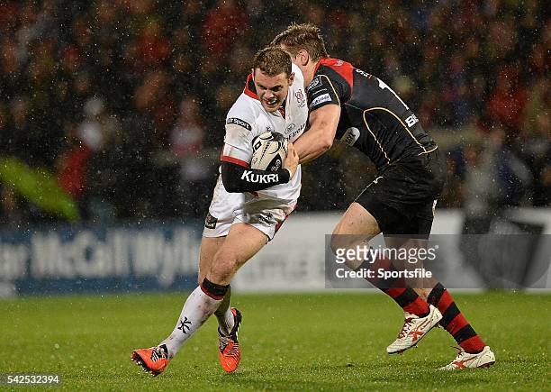 November 2014; Darren Cave, Ulster, is tackled by Matthew Pewtner, Newport Gwent Dragons. Guinness PRO12, Round 7, Ulster v Newport Gwent Dragons,...