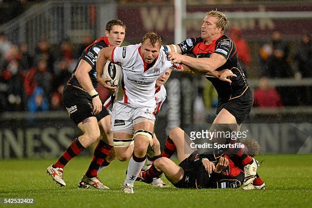November 2014; Roger Wilson, Ulster, is tackled by Andy Powell, Newport Gwent Dragons. Guinness PRO12, Round 7, Ulster v Newport Gwent Dragons,...