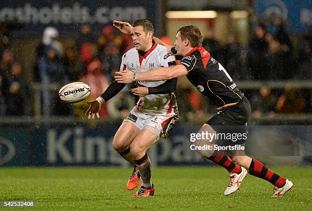 November 2014; Darren Cave, Ulster, is tackled by Matthew Pewtner, Newport Gwent Dragons. Guinness PRO12, Round 7, Ulster v Newport Gwent Dragons,...