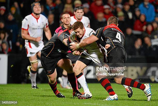 November 2014; Paddy Jackson, Ulster, is tackled by Dan Way, left, and Jamie Thomas, Newport Gwent Dragons. Guinness PRO12, Round 7, Ulster v Newport...