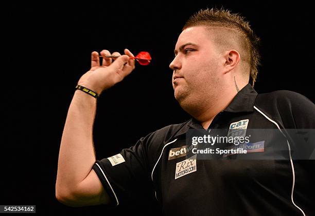 Febraury 2016; Michael Smith competes against Dave Chisnall during the Betway Premier League Darts. 3 Arena, Dublin. Picture credit: Seb Daly /...