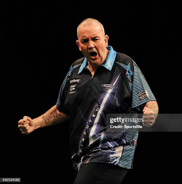 Febraury 2016; Phil Taylor celebrates following his win against Gary Anderson during the Betway Premier League Darts. 3 Arena, Dublin. Picture...