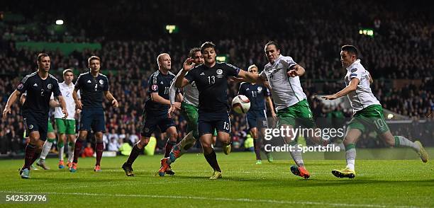 November 2014; John O'Shea and Robbie Keane, right, Republic of Ireland, in action against Chris Martin, Scotland. UEFA EURO 2016 Championship...