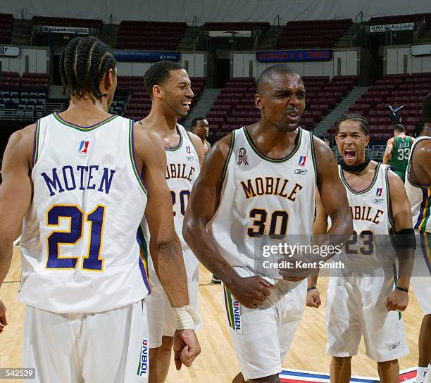 Derek Hood of the Mobile Revelers celebrates with his teammates after the NBDL playoff game against the North Charleston Lowgators at the North...