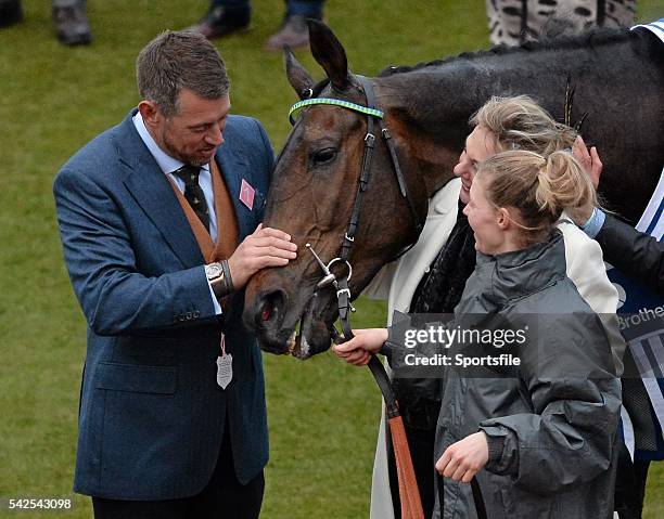 March 2016; Golfer Lee Westwood, left, with Ballyalton after it won the Close Brothers Novices' Handicap Steeple Chase. Prestbury Park, Cheltenham,...