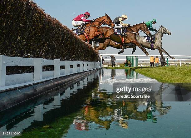 March 2016; Eventual winner Black Hercules, centre, with Ruby Walsh up, jumps the water jump between Bristol De Mai, with Daryl Jacob up, front, and...