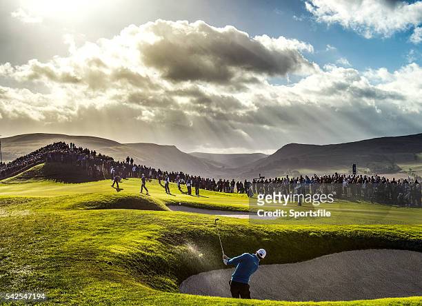 September 2014; Rory McIlroy, Team Europe, plays from a bunker back onto the 8th fairway during the Morning Fourball Matches. The 2014 Ryder Cup, Day...