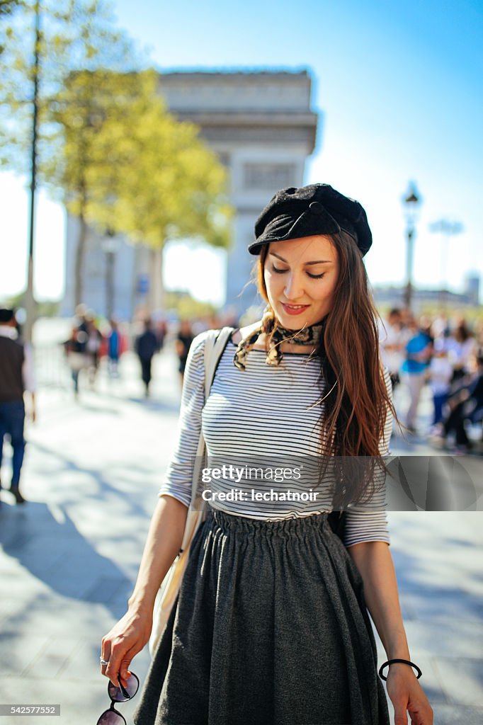 Young tourist woman relaxing in Paris