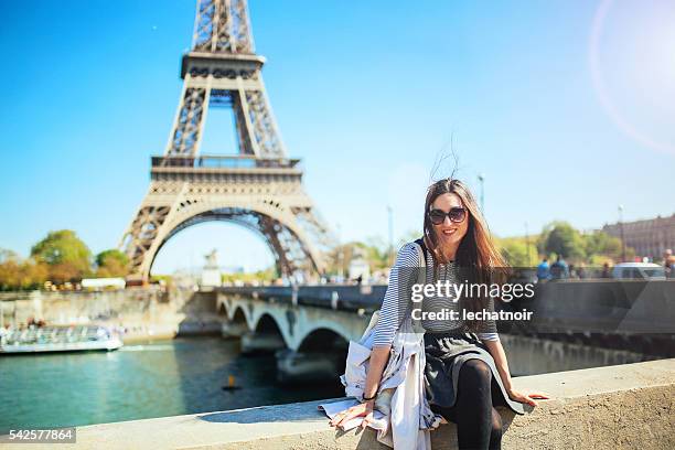 young woman relaxing in paris - paris summer stock pictures, royalty-free photos & images