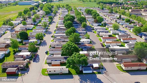 vast trailer park, mobile home court on sunny summer morning. - affordability stock pictures, royalty-free photos & images