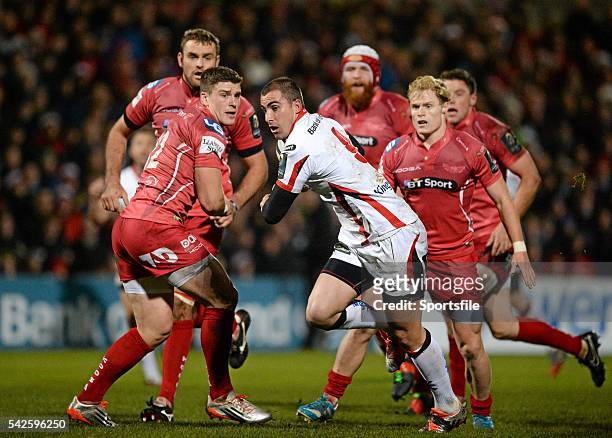 December 2014; Ruan Pienaar, Ulster, evades the tackle of Scott Williams, Scarlets. European Rugby Champions Cup 2014/15, Pool 3, Round 3, Ulster v...