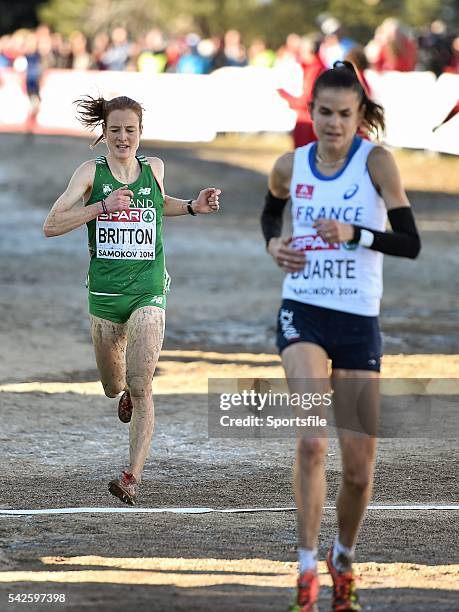 December 2014; Ireland's Fionnuala Britton crosses the finish line in sixth place, behind 2013 race winner France's Sophie Duarte in the Women's...