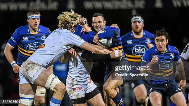 January 2015; Dave Kearney, Leinster, is tackled by Richie Gray, left, and Rory Kockott, Castres. European Rugby Champions Cup 2014/15, Pool 2, Round...